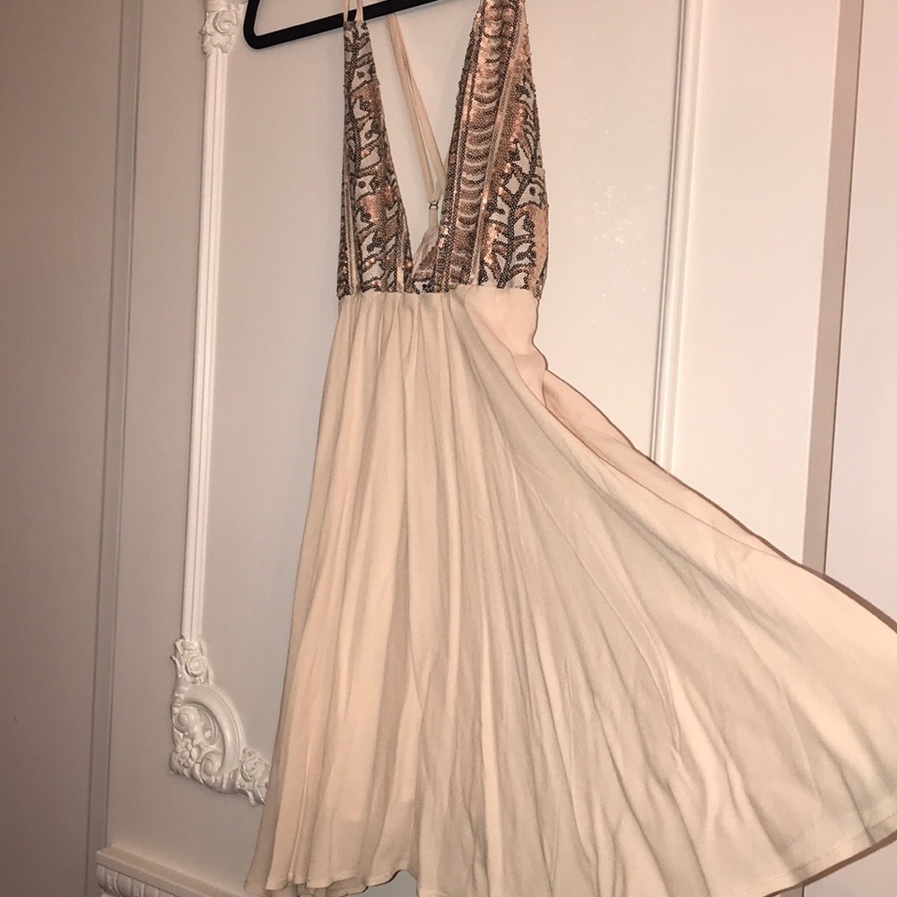 Sparkly & flowy mini dress